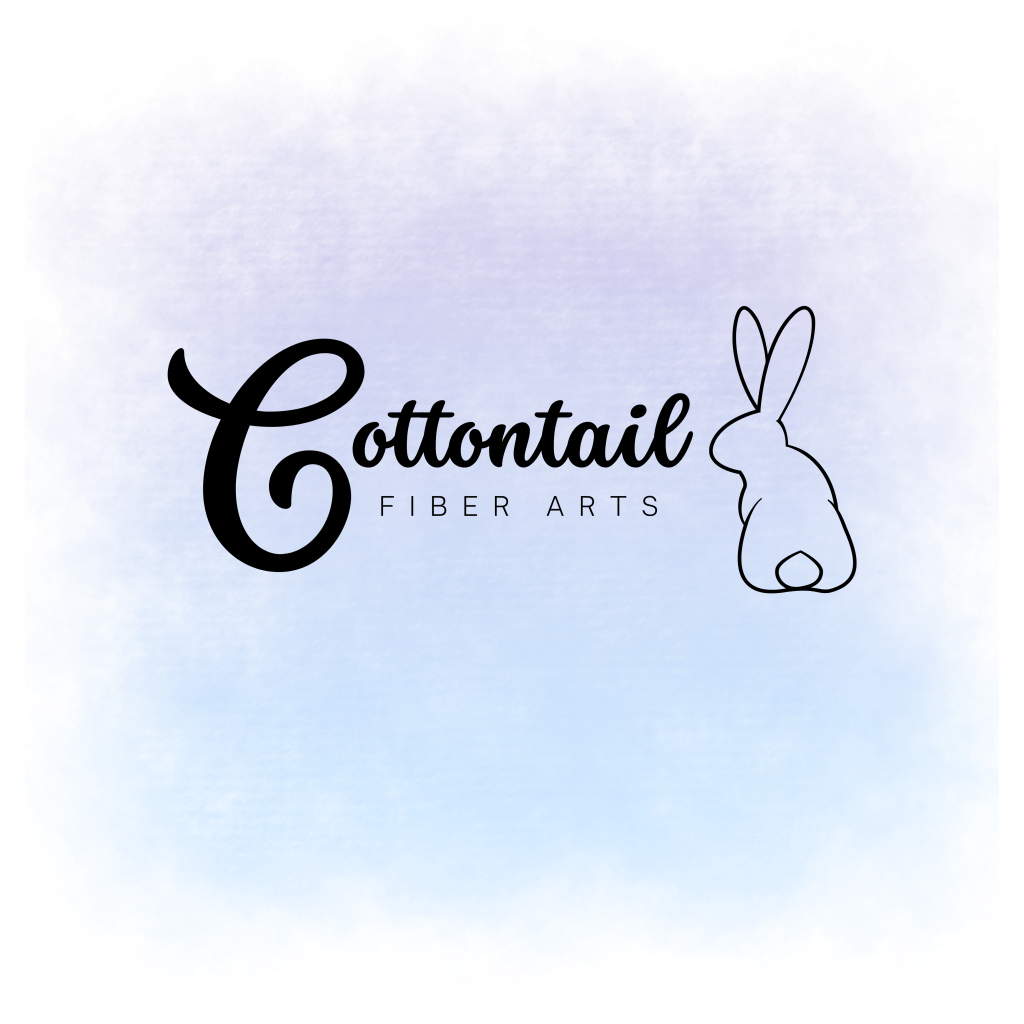 White logo with a purple to blue gradient. Text reads, Cottontail Fiber Arts, and there is a line art bunny next to the text.